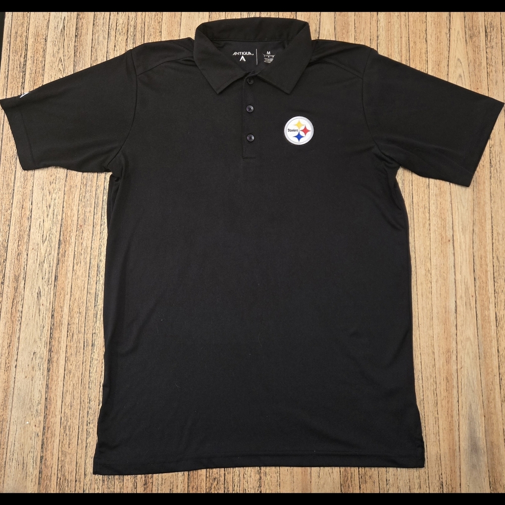 Antigua Men's Black Polo Shirt With‎ Steelers Logo On Front.